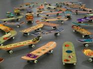 Mounir Fatmi, Maximum Sensation, 2010. Fifty skateboards, plastic, metal, textile, 5 × 8 × 31 11/16 in. (12.7 × 20.3 ×80.5 cm). Brooklyn Museum.
